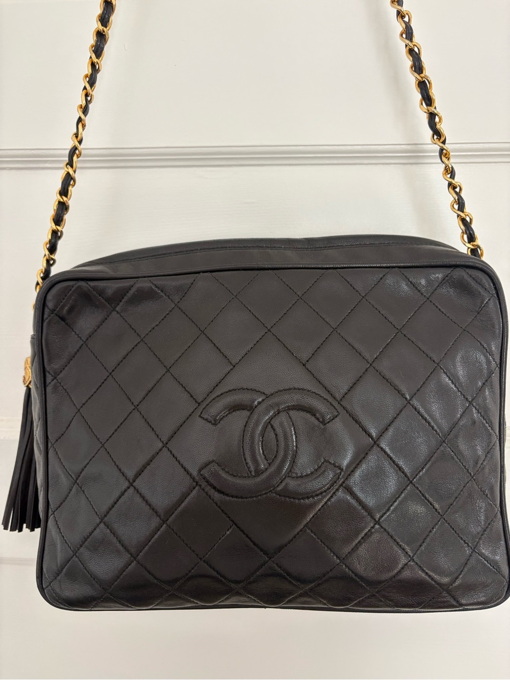 CHANEL Black Quilted Lambskin Camera Shoulder Bag with Gold Chain